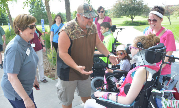 Larry meets some of Madonna's young patients